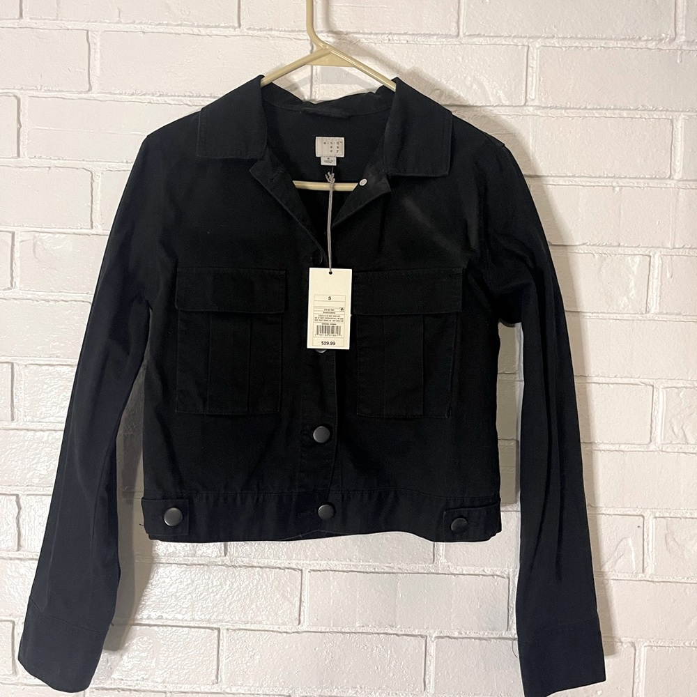 Black jean jacket. Shorter.